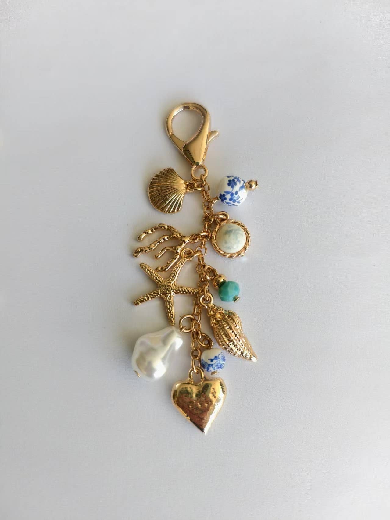 PORCELAIN SEA LIFE PEARL HEART TURQ BEAD BAG CHARM
