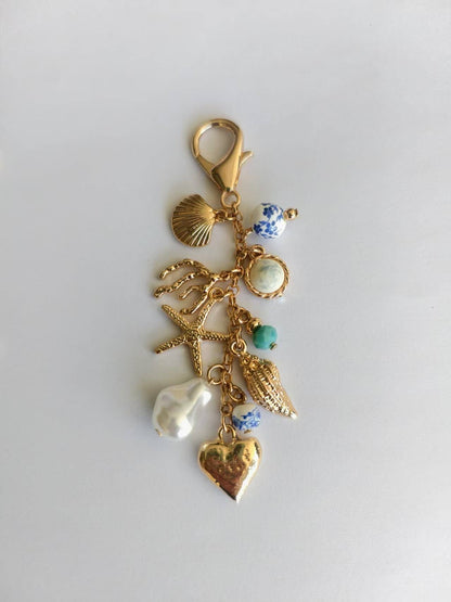 PORCELAIN SEA LIFE PEARL HEART TURQ BEAD BAG CHARM