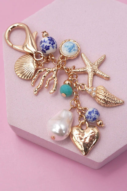PORCELAIN SEA LIFE PEARL HEART TURQ BEAD BAG CHARM